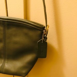 Mini cross body coach bag.